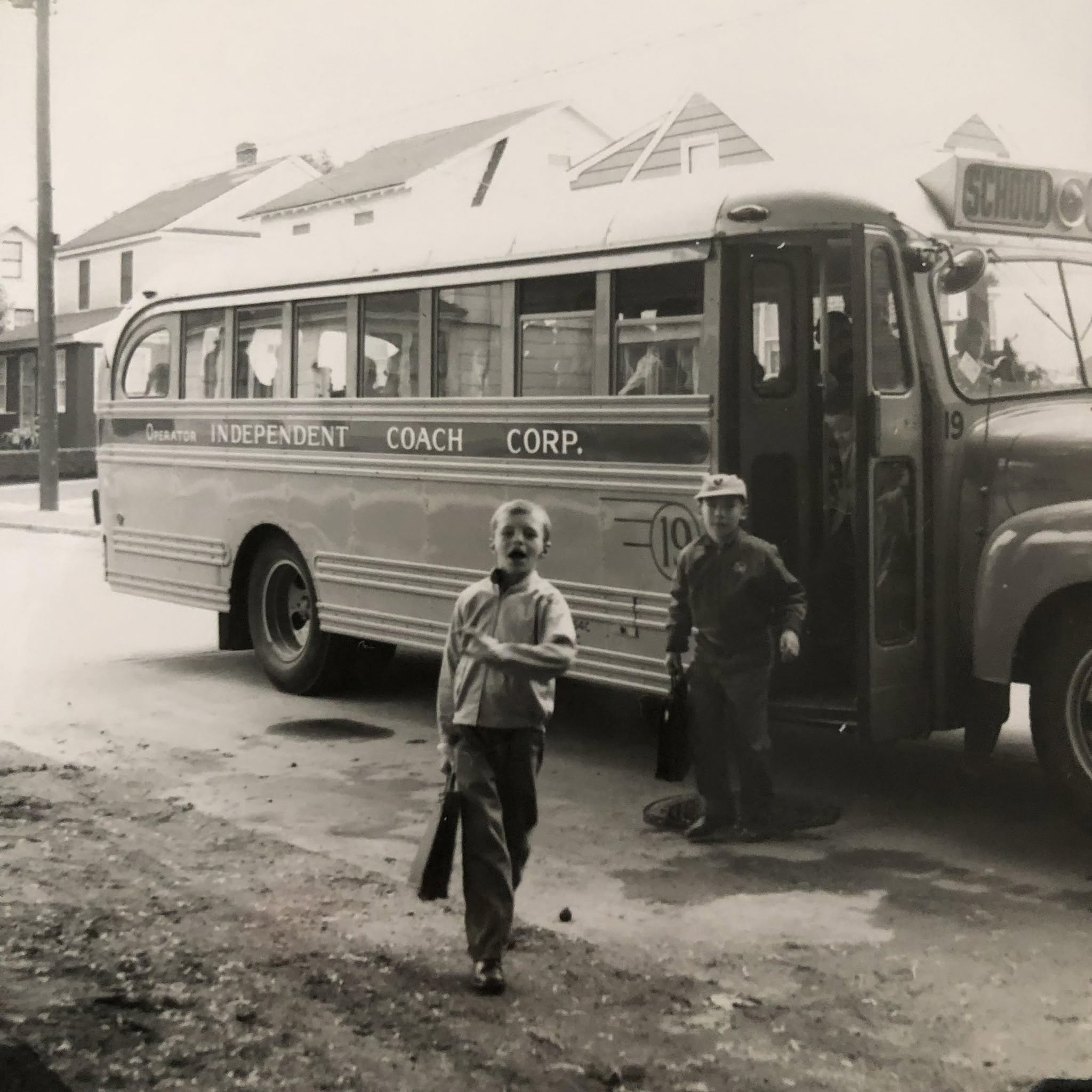 An Independent Coach school bus parked near the Fire Island Lighthouse on Long Island.